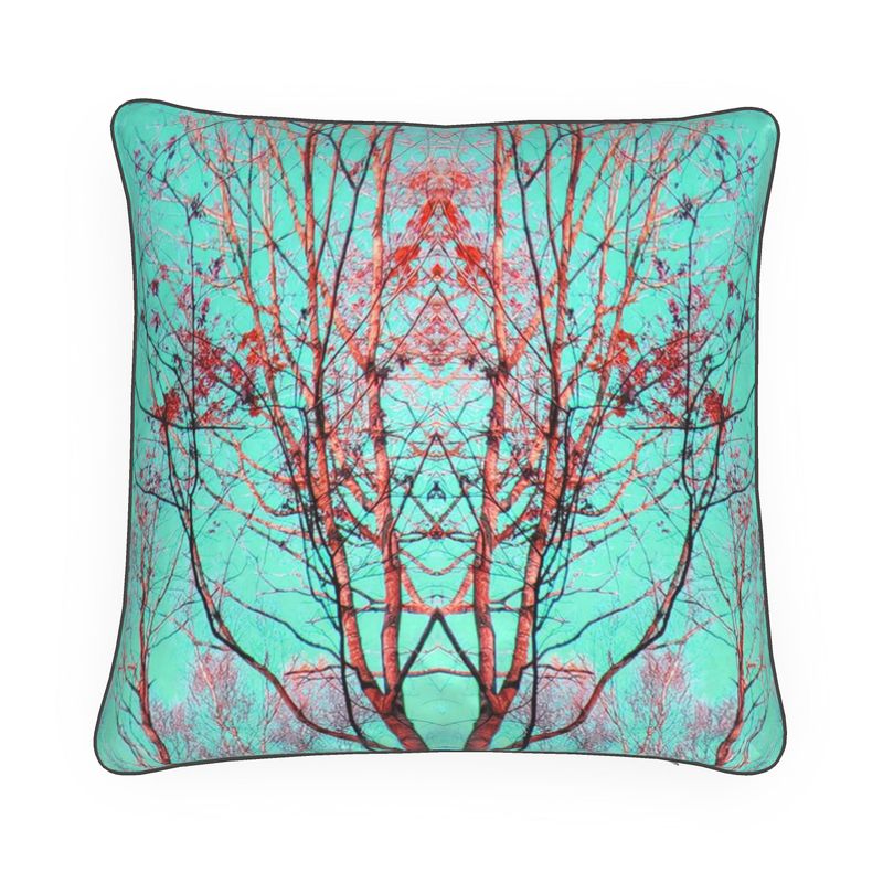 Cushion with birch tree inspired design. Blues, pinks.