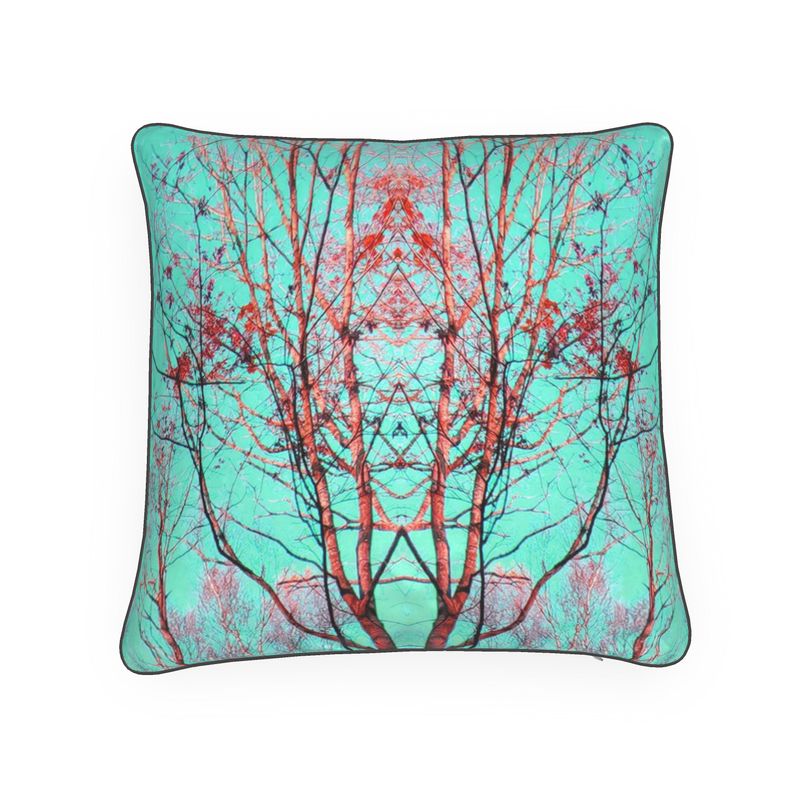 Cushion with birch tree inspired design. Blues, pinks.
