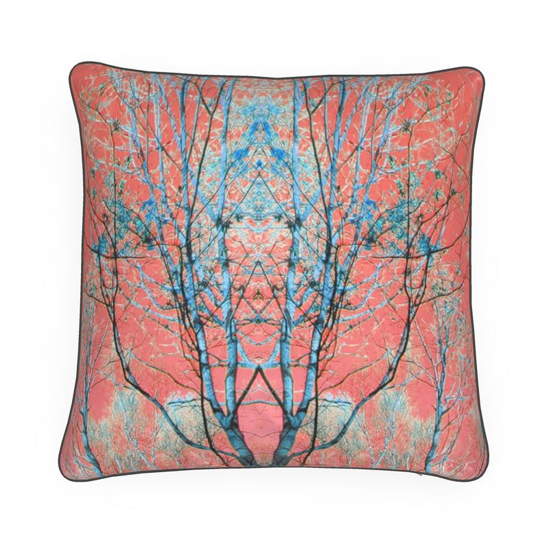 Designer tree inspired cushion. Pinks, blues. Soft and velvety.